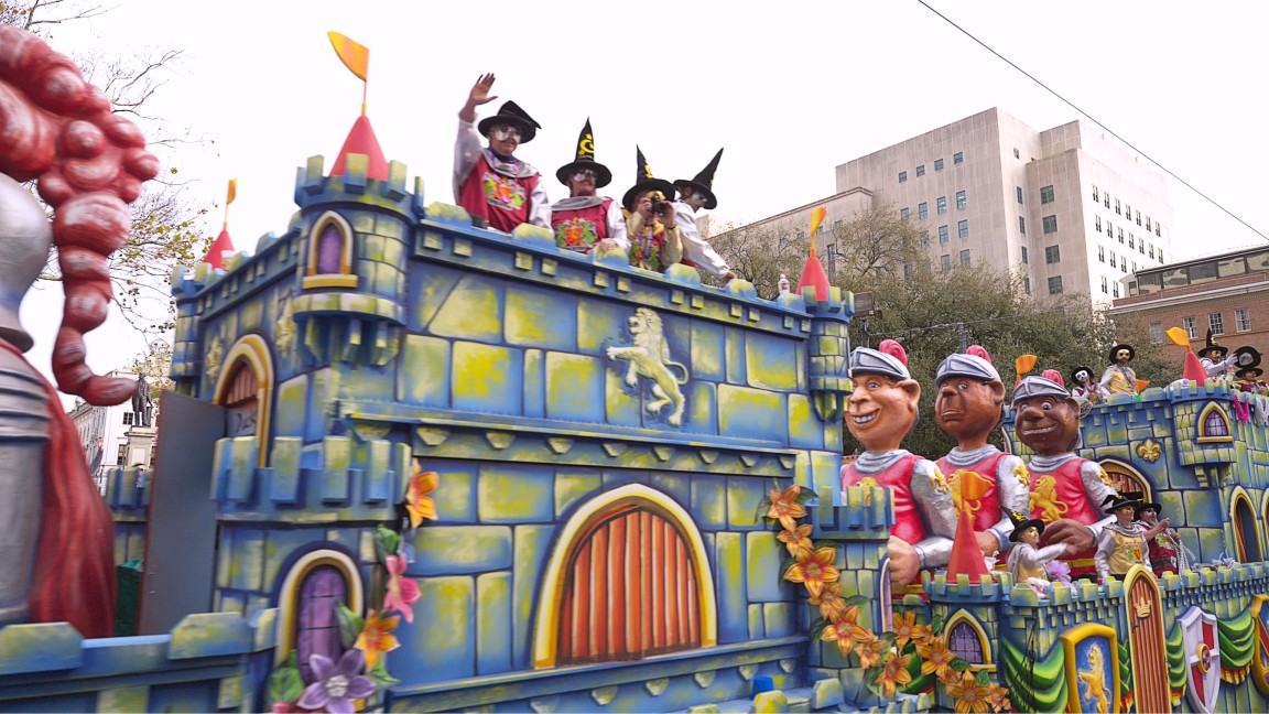 Stewart F. Lane_ Bonnie Comley and sons atop the Krewe of King Arthur Mardi Gras Parde Float